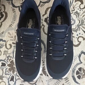 Navy Skechers Slip ons, size 7,
